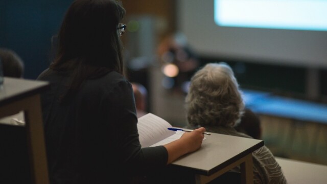 Conference participants listening and taking notes during Pichler’s keynote “Kinship and Ethnicity in the Balkans: Social Realities, Concepts of Belonging and National Ideologies”
